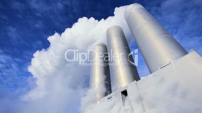 Steam From Geothermal Energy Plant Chimneys