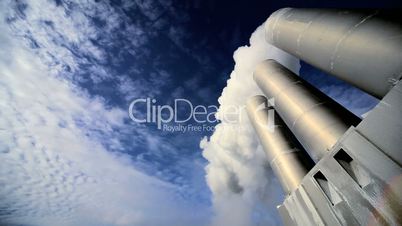 Steam From Geothermal Energy Plant Chimneys