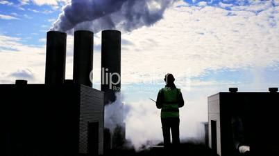 Engineer in Silhouette at Geothermal Power Station