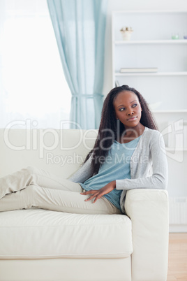 Woman relaxing in livingroom