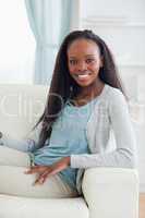 Close up of woman relaxing on sofa