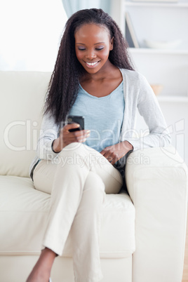 Woman texting with cellphone