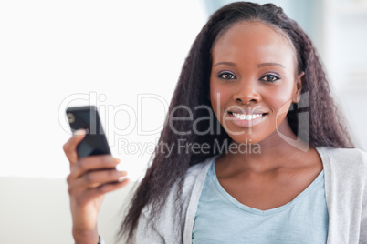 Close up of woman with her cellphone