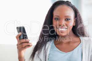 Close up of woman with her cellphone