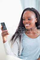 Close up of woman reading text message