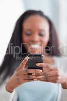Close up of smartphone being held by woman