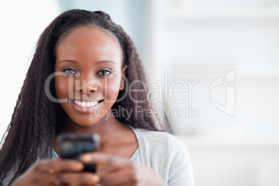 Close up of woman holding cellphone