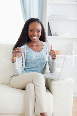 Woman satisfied with online shopping