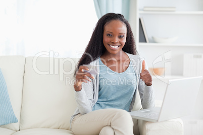 Woman happy about online shopping