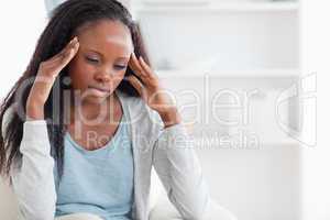 Woman experiencing a headache