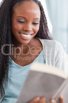 Close up of woman reading a book
