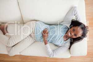 Woman lying on the couch