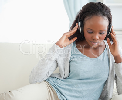 Close up of woman listening to music