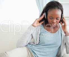 Close up of woman listening to music