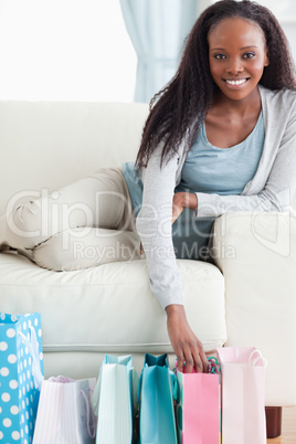 Close up of young woman happy about her shopping