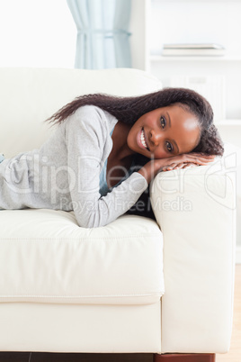 Young woman lying on the couch