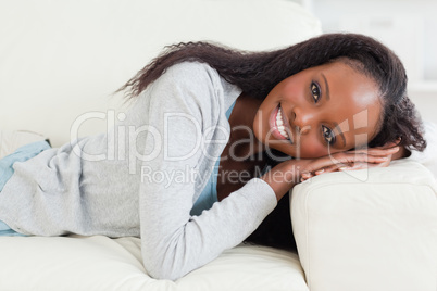 Close up of woman lying on the sofa
