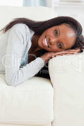 Close up of woman lying on the couch