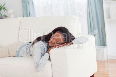 Woman resting in sofa