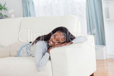 Woman resting on couch