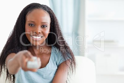 Close up of woman with remote control