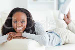 Woman releasing tension on couch