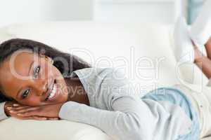 Close up of woman taking a moment off on sofa