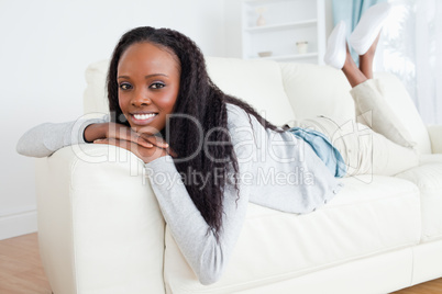 Woman having a moment of relaxation on sofa