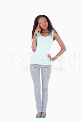 Woman having an idea on a white background