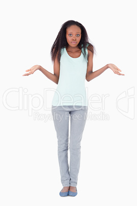 Woman having no idea on a white background