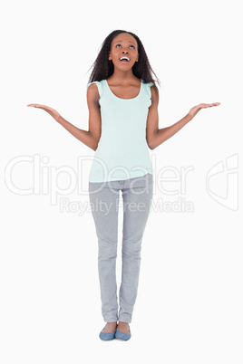 Desperate woman asking for help from above on white background