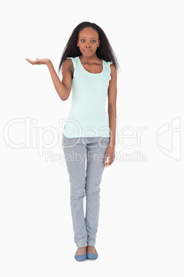 Woman presenting something on a white background