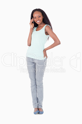 Woman on the phone on white background