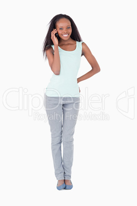 Woman calling on a white background