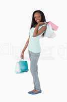 Woman with shopping on white background
