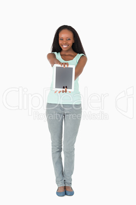 Woman presenting tablet on white background