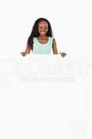 Woman holding wild card on white background