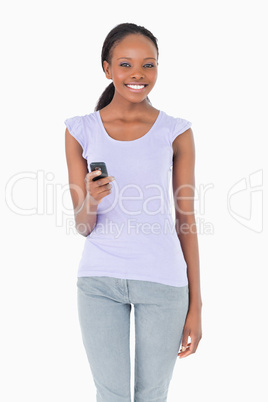 Close up of woman writing a text message on white background
