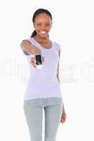 Close up of phone being presented by woman on white background
