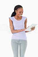Close up of woman using tablet on white background