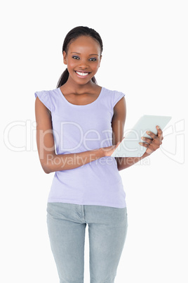 Close up of woman using her tablet on white background