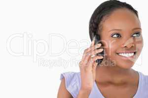Close up of woman on the phone on white background