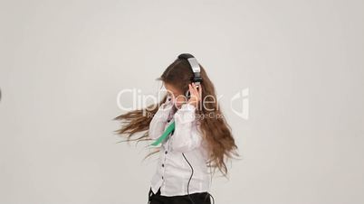 Little girl with headphones