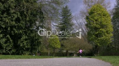 Little Girl Learning How To Skip Rope