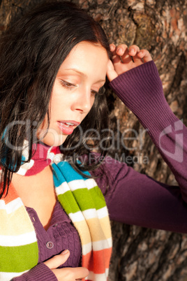 Winter young woman in romantic sunset scenery