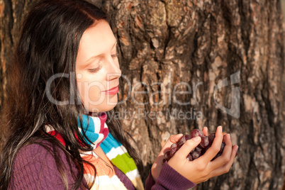 Winter young woman in romantic sunset scenery