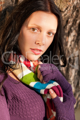 Winter young woman in romantic sunset scenery