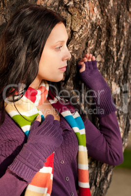 Winter young woman in romantic sunset scenery