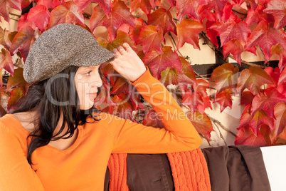 Autumn park bench young woman relaxing