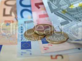 Euro note and coin